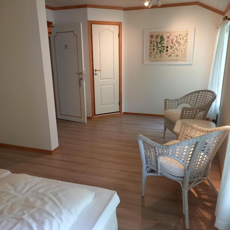 Posezení v ubytování Sandbrekke Gjestegård