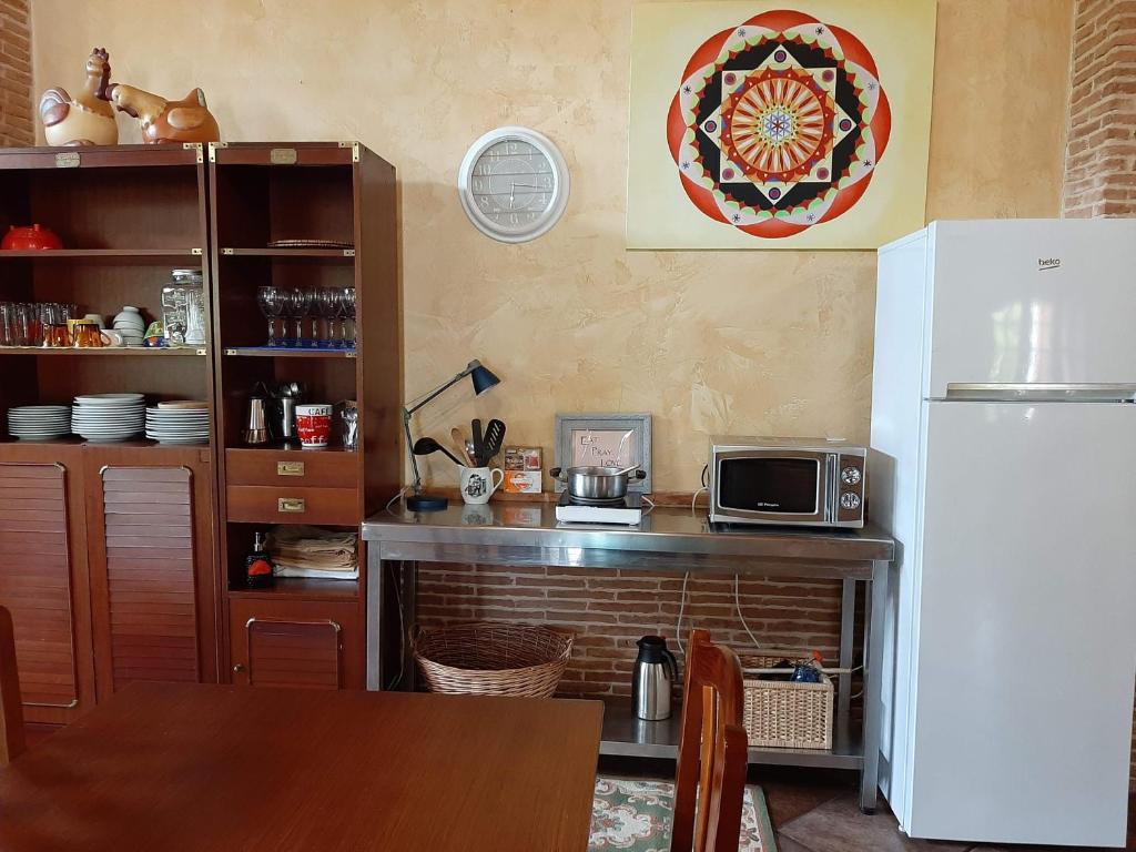 Kuchyňa alebo kuchynka v ubytovaní Lhamo Mandala House