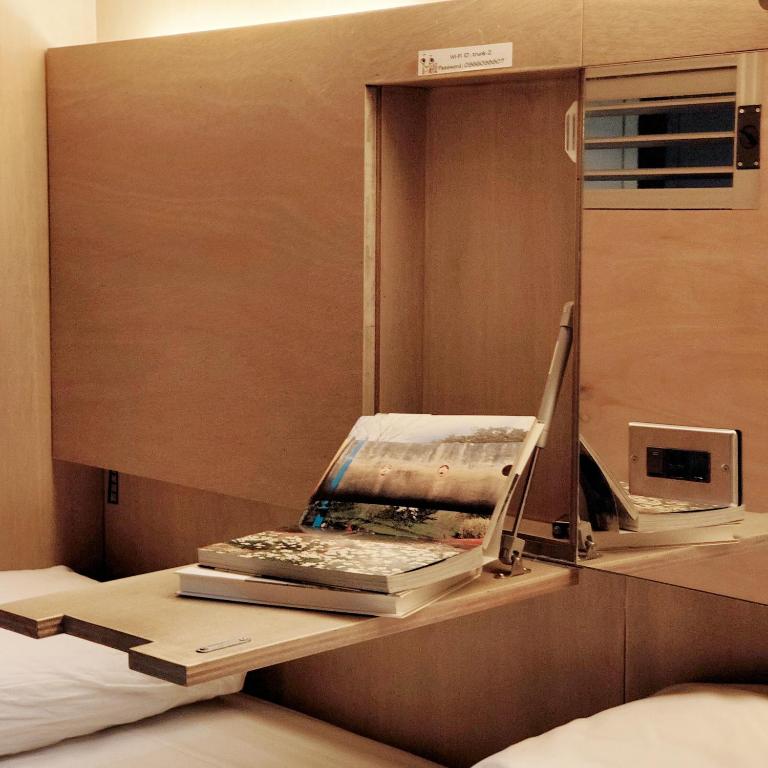 Postel nebo postele na pokoji v ubytování Jerry's Mazehut Hostel