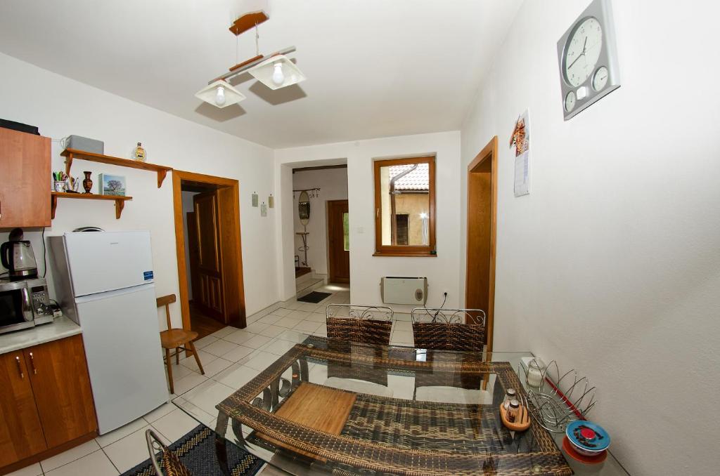 Kuchyň nebo kuchyňský kout v ubytování Apartmany pod Tatrami