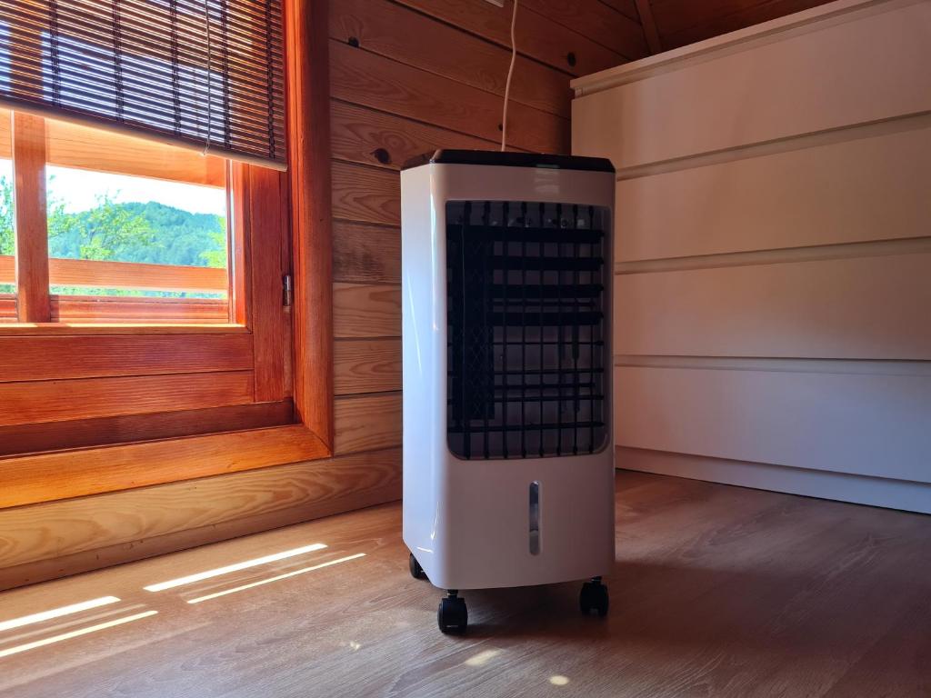 a small appliance in a room next to a window at Guest House Rankić in Mokra Gora