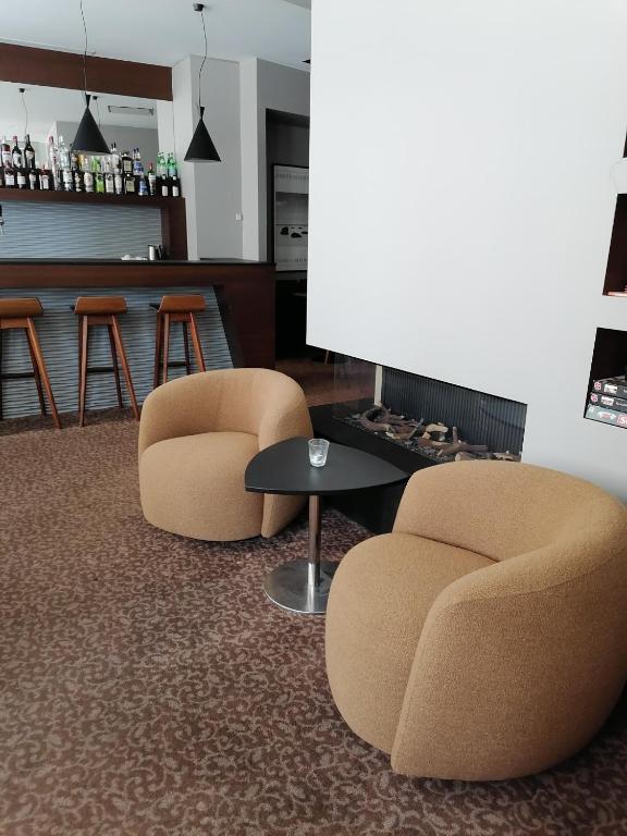 Posezení v ubytování Square Hotel