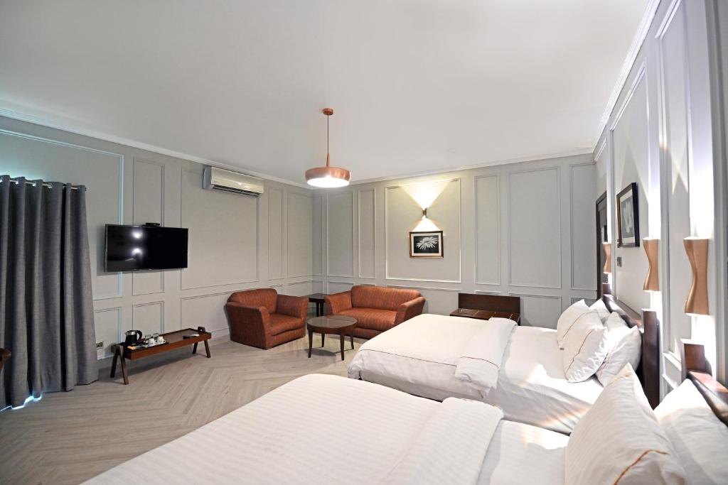 The Residency Hotel - Deluxe Family Room