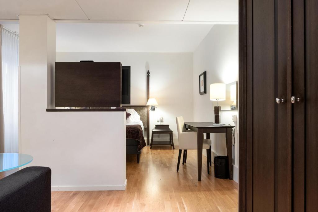 TV a/nebo společenská místnost v ubytování Elite Hotel Arcadia