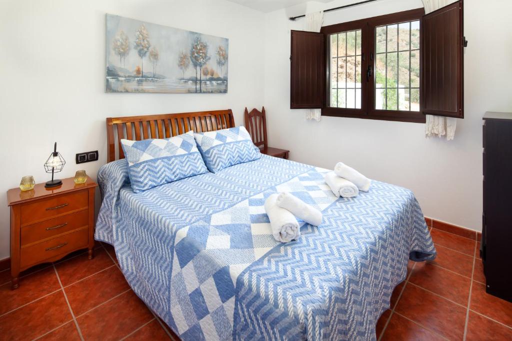 A bed or beds in a room at Casita T