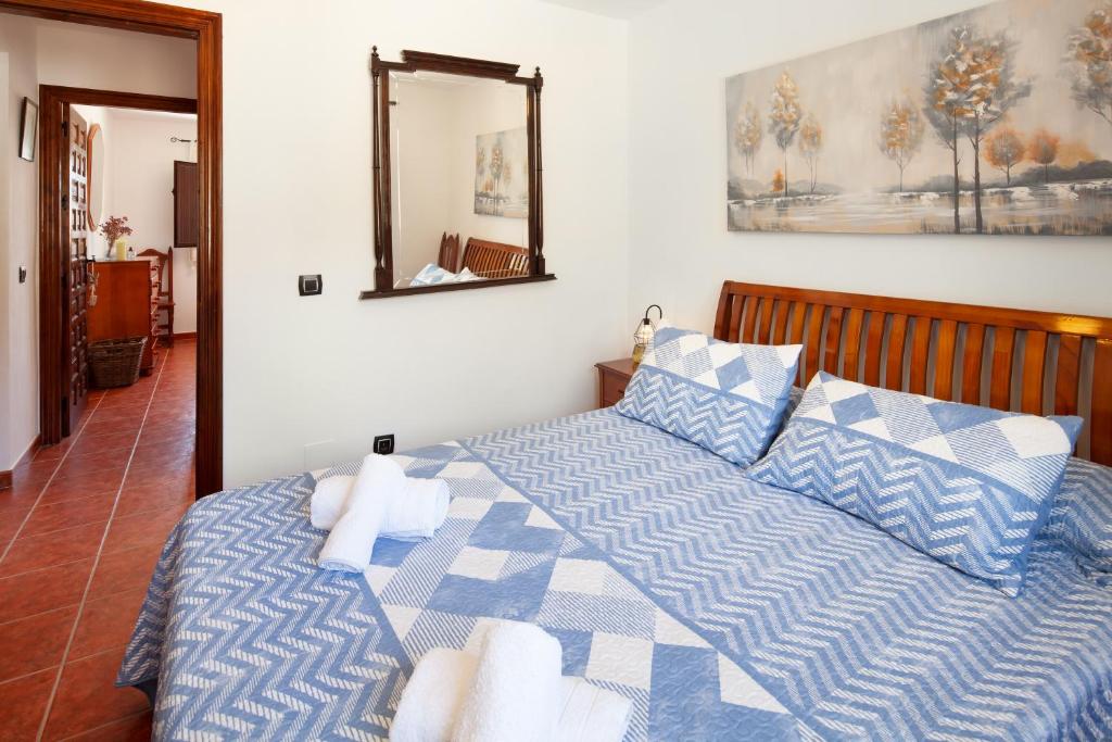 A bed or beds in a room at Casita T