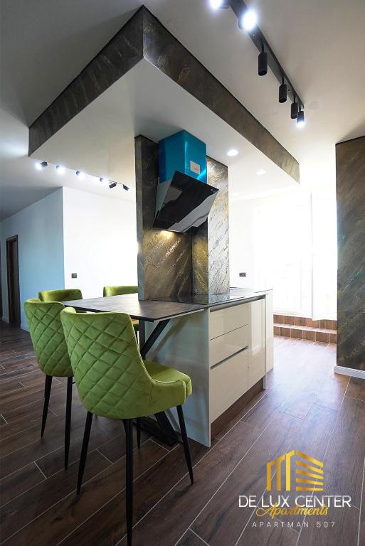 Kuchyň nebo kuchyňský kout v ubytování DeLux Center Apartments Inđija