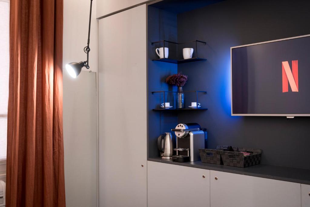 Příslušenství pro přípravu čaje a kávy v ubytování MiHotel Charité