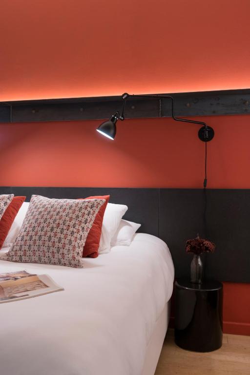Postel nebo postele na pokoji v ubytování MiHotel Charité