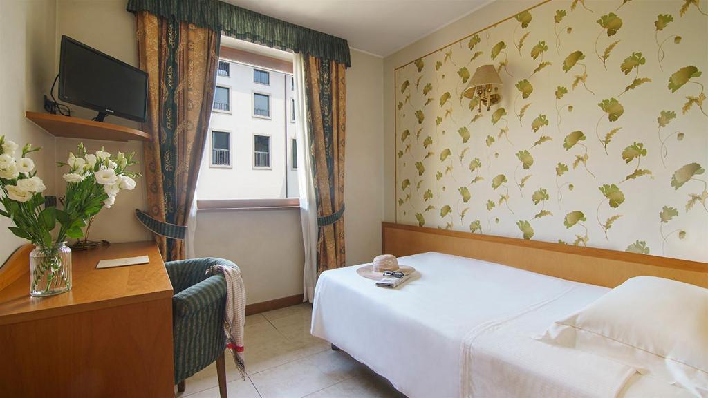 TV a/nebo společenská místnost v ubytování Bes Hotel Villa Zoia