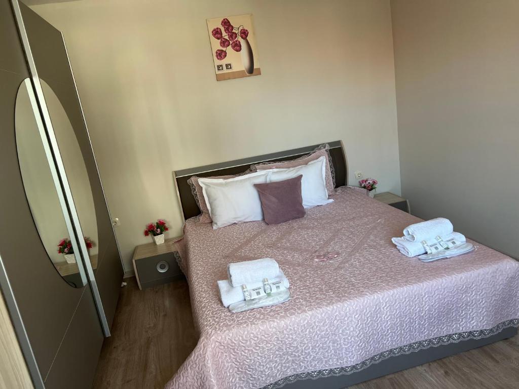 Postel nebo postele na pokoji v ubytování Guest House Tatiana /Къща за гости ТАТЯНА