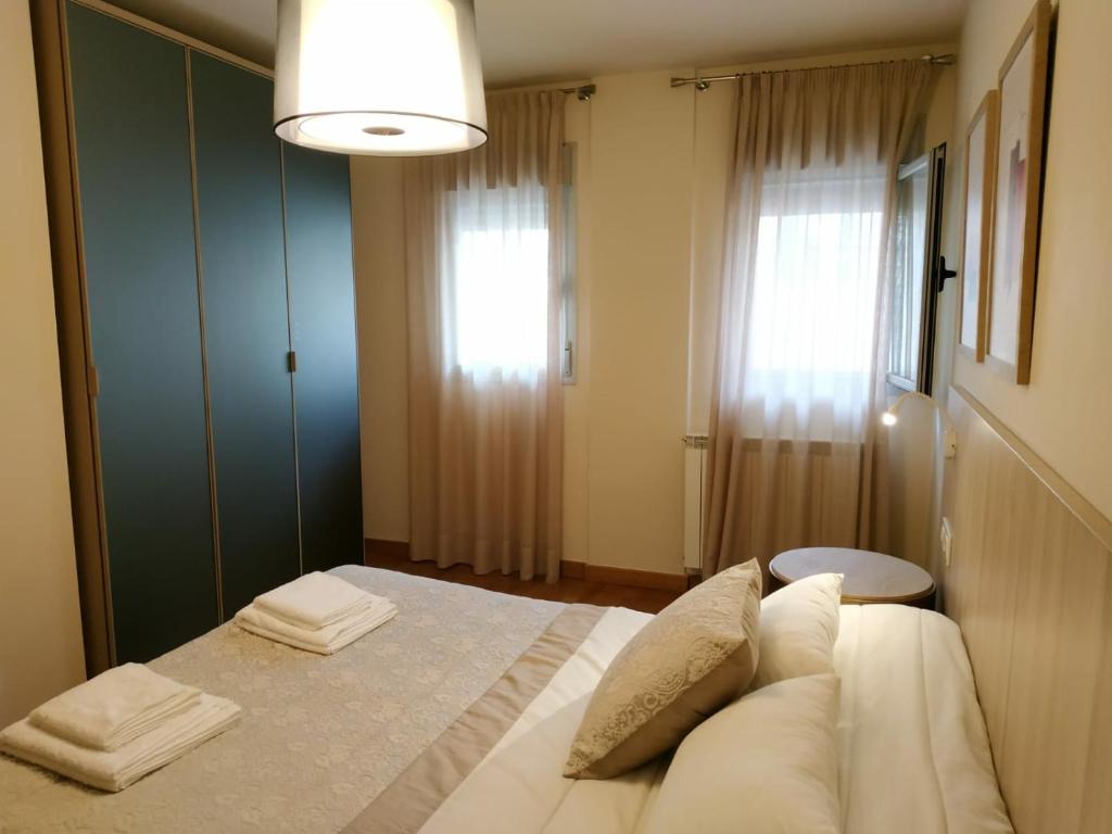 Postel nebo postele na pokoji v ubytování El Bordon