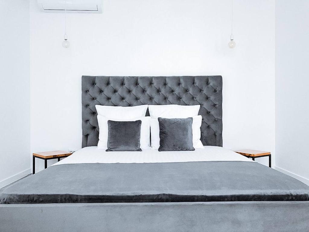 Postel nebo postele na pokoji v ubytování Klaster SeaView Hotel