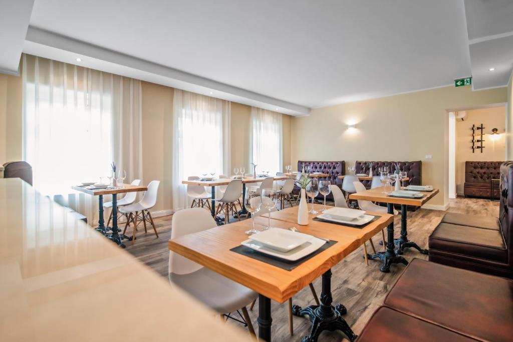 Posezení v ubytování TOSCANINA Garni Hotel