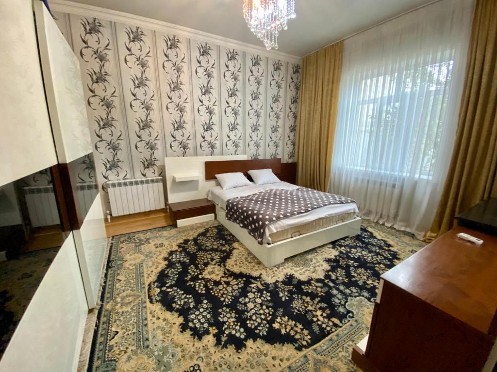 Postel nebo postele na pokoji v ubytování House in Quba
