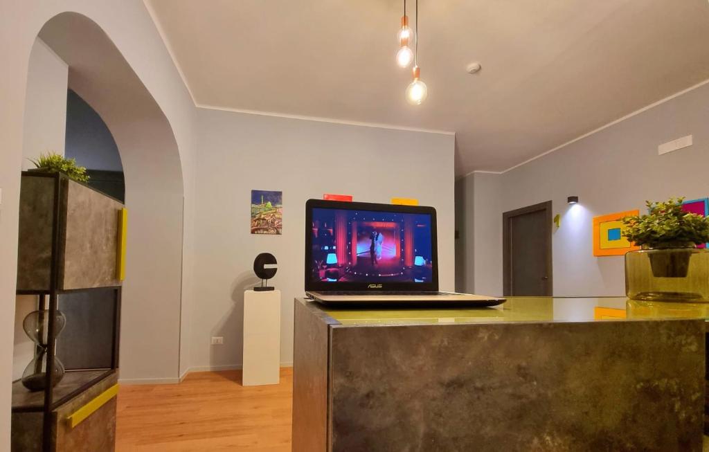 TV a/nebo společenská místnost v ubytování Residenza Gramsci