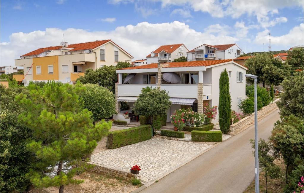 an aerial view of a house in a suburb at Stunning Apartment In Mandre With Wifi in Mandre