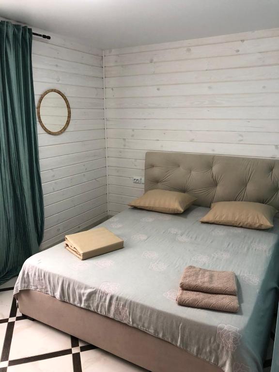 Postel nebo postele na pokoji v ubytování Svitiaz Griada