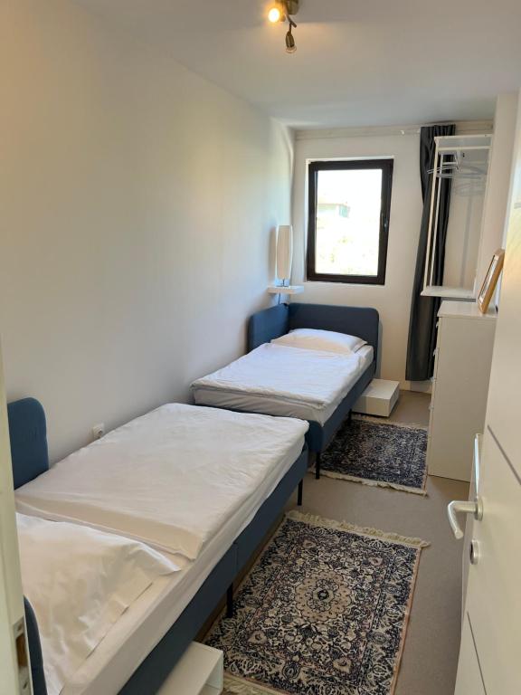 Postel nebo postele na pokoji v ubytování Apartments Porec