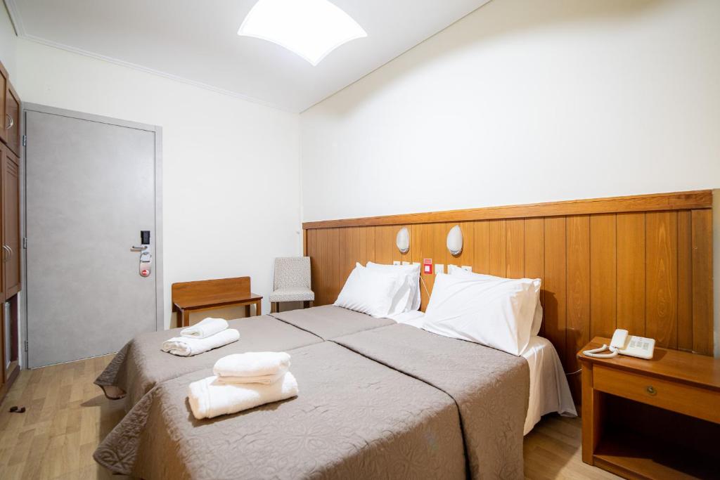 Postel nebo postele na pokoji v ubytování Hotel Philippos