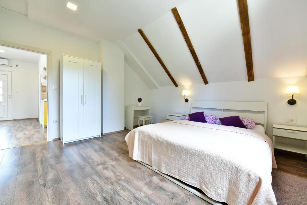 Posteľ alebo postele v izbe v ubytovaní Apartman Doris