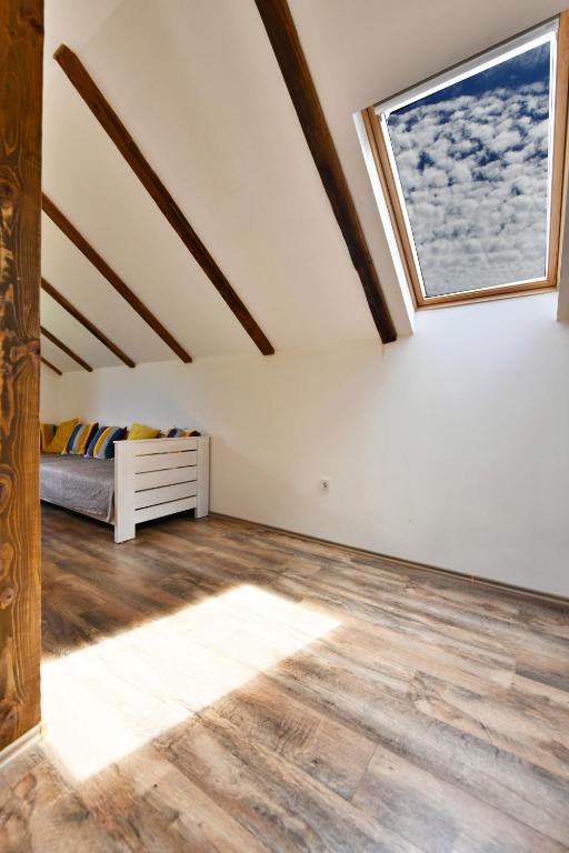 Posteľ alebo postele v izbe v ubytovaní Apartman Doris