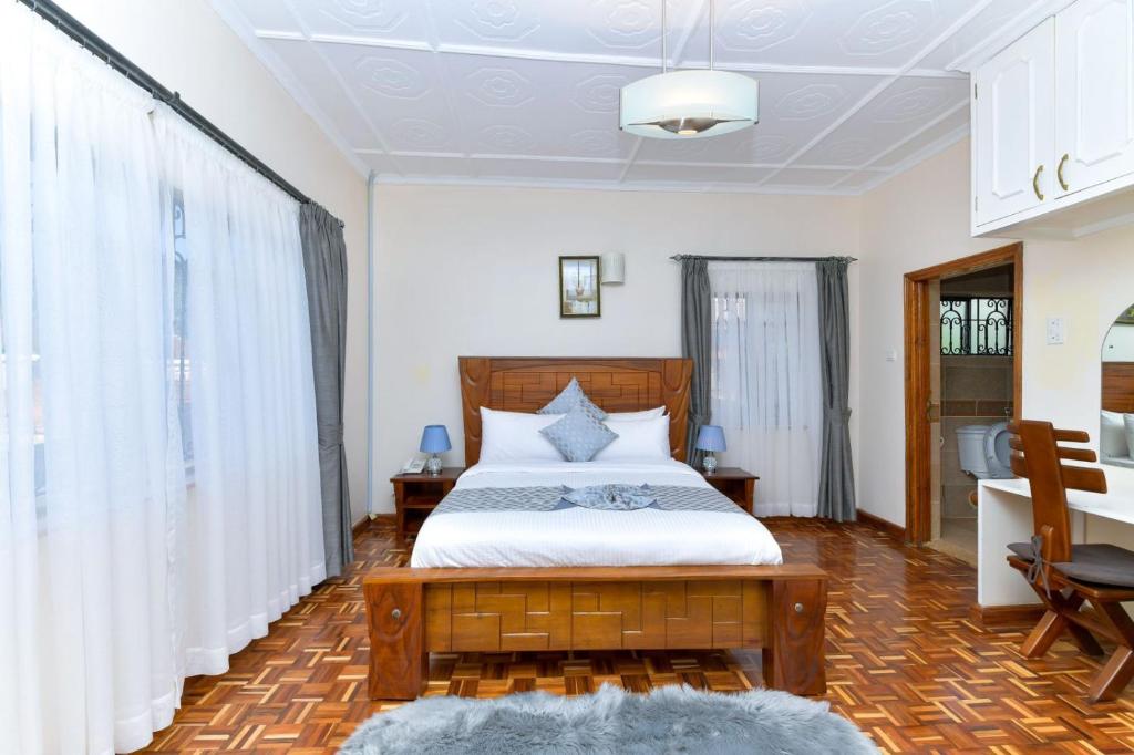 Voodi või voodid majutusasutuse The Premier Suites toas