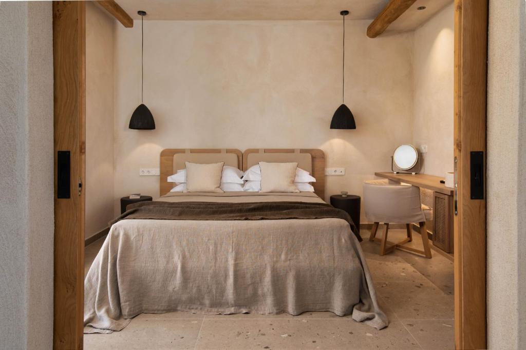 Posteľ alebo postele v izbe v ubytovaní Opuntia Suites