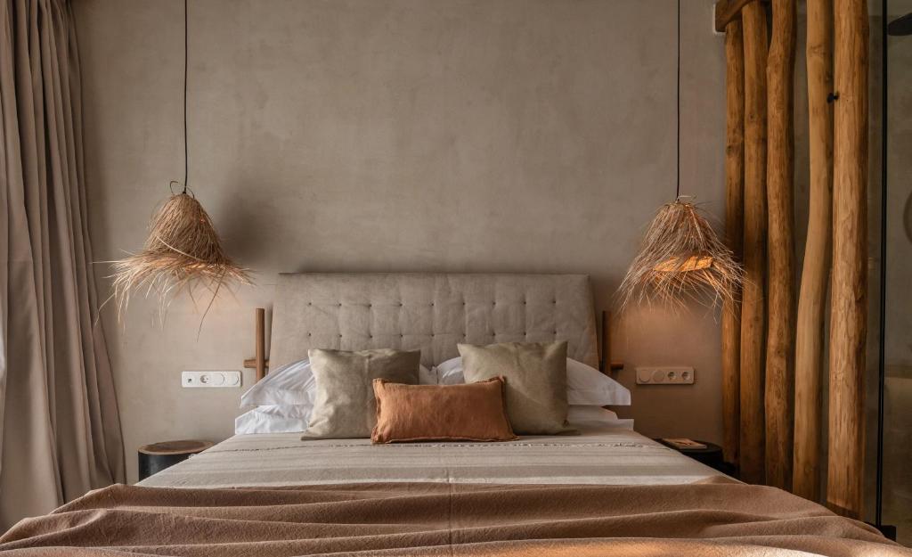 Posteľ alebo postele v izbe v ubytovaní Opuntia Suites