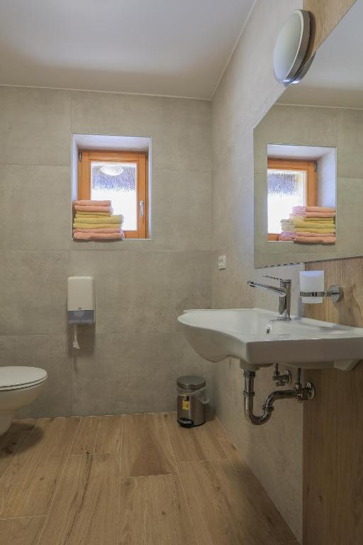 Koupelna v ubytování Apartments Mulej