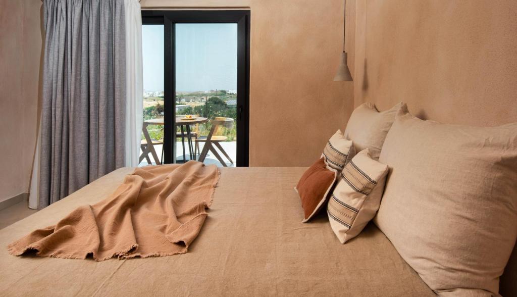 Posteľ alebo postele v izbe v ubytovaní Opuntia Suites