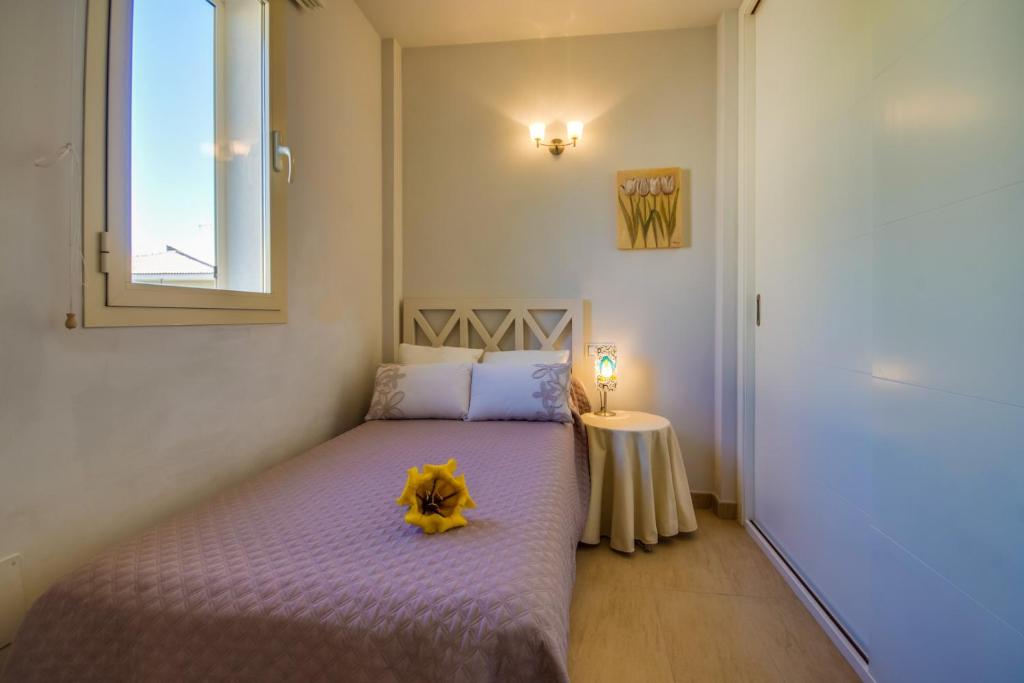 A bed or beds in a room at Ideal Property Mallorca - Tarongina