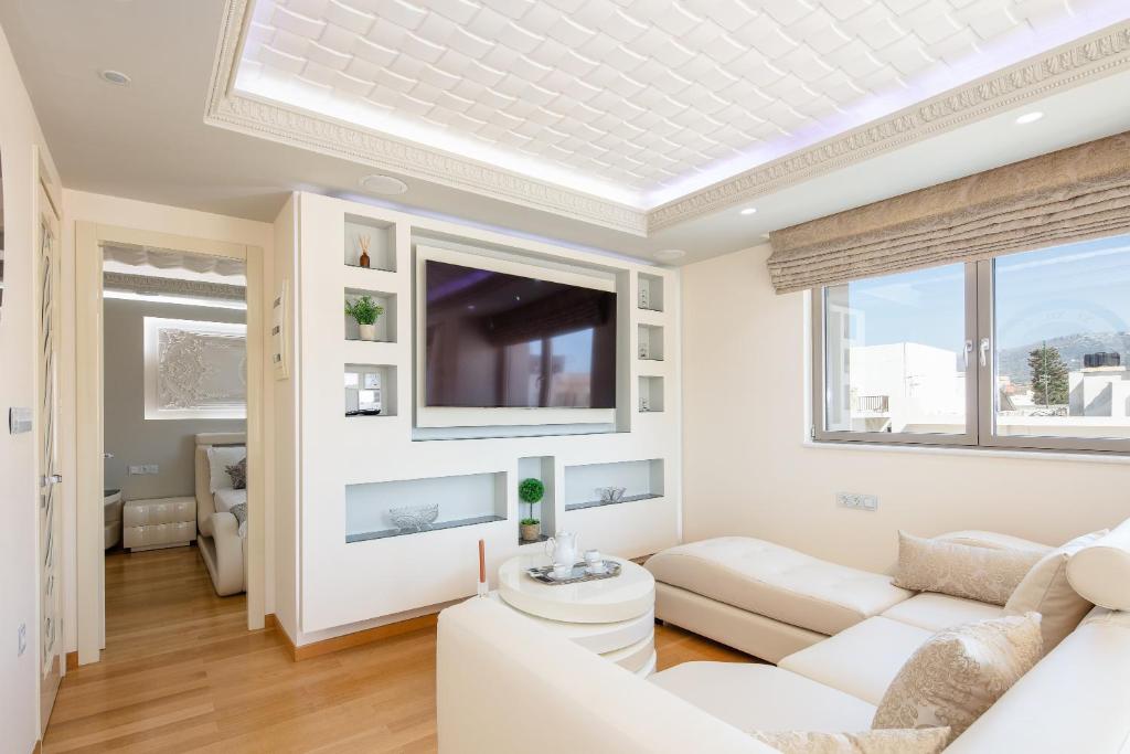 Posezení v ubytování De President Suite, DeMaNi President Suites