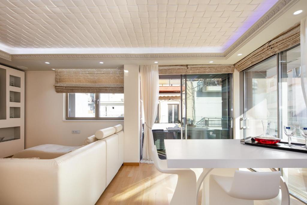 Posezení v ubytování De President Suite, DeMaNi President Suites