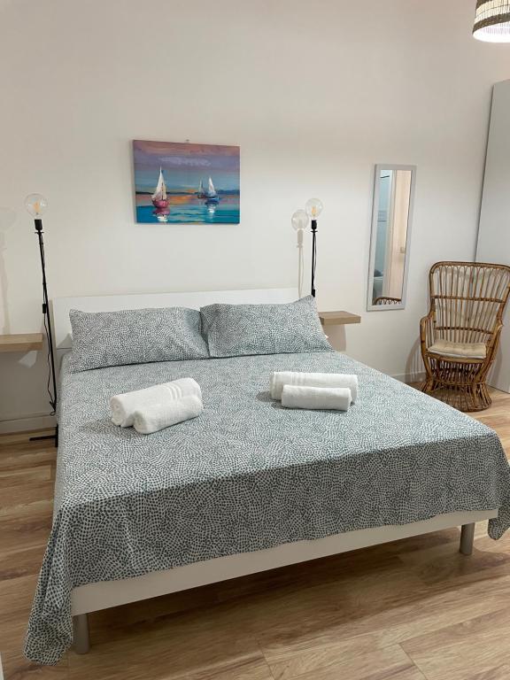 Postel nebo postele na pokoji v ubytování Aria di mare