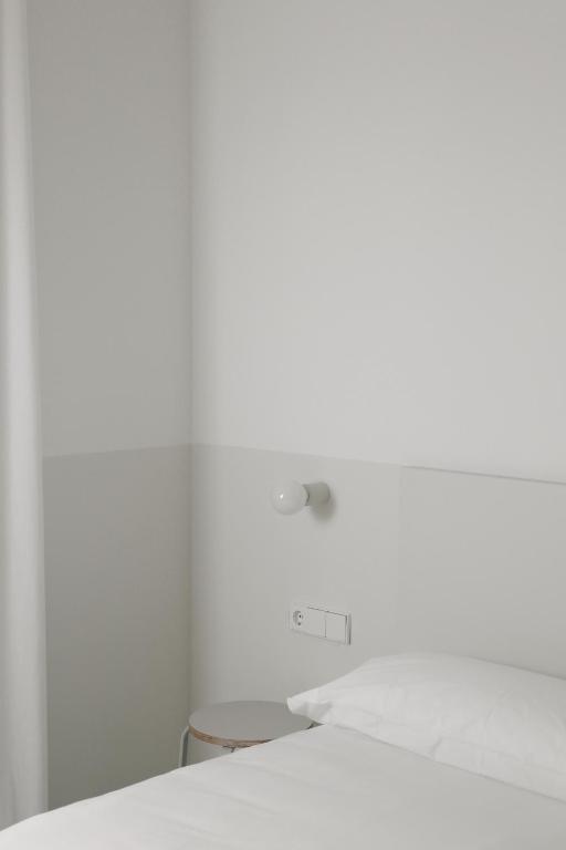 Postel nebo postele na pokoji v ubytování HOTEL LA FONDA B&B