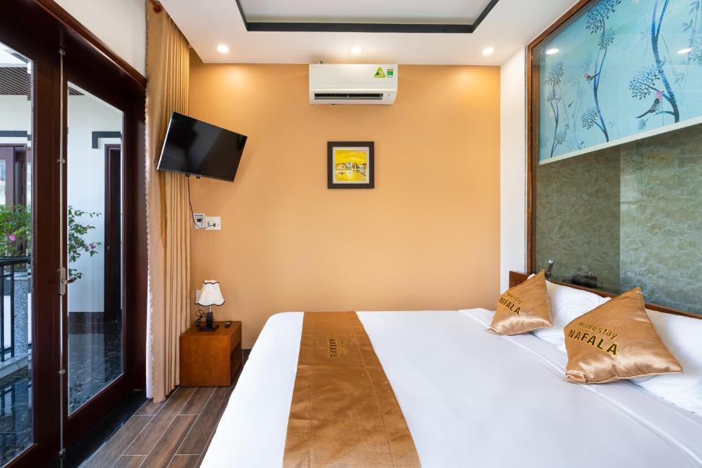 Giường trong phòng chung tại NaFaLa Homestay