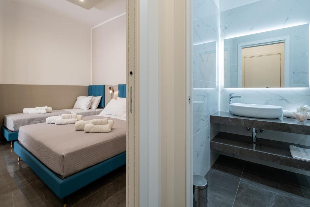 Postel nebo postele na pokoji v ubytování Moonlight B&B