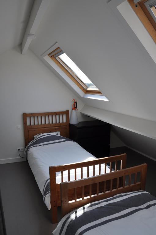 Postel nebo postele na pokoji v ubytování Gîte de Lombard