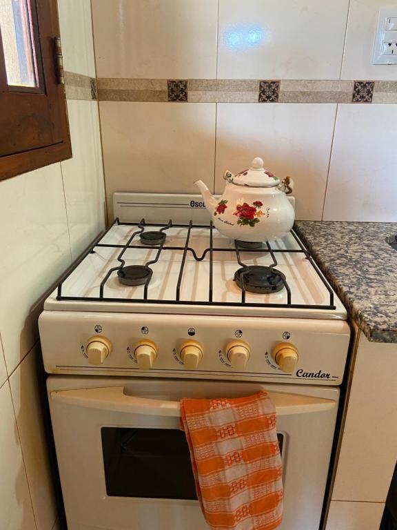 Kuchyň nebo kuchyňský kout v ubytování Cabañas La Suyana