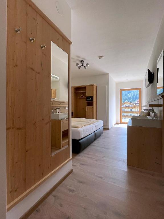 Posteľ alebo postele v izbe v ubytovaní Hotel & Suites Glück Auf