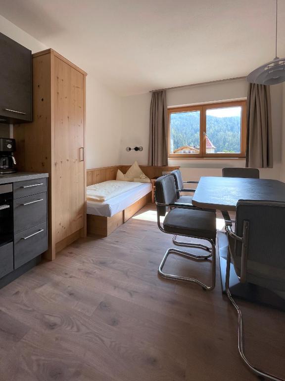 Posteľ alebo postele v izbe v ubytovaní Hotel & Suites Glück Auf