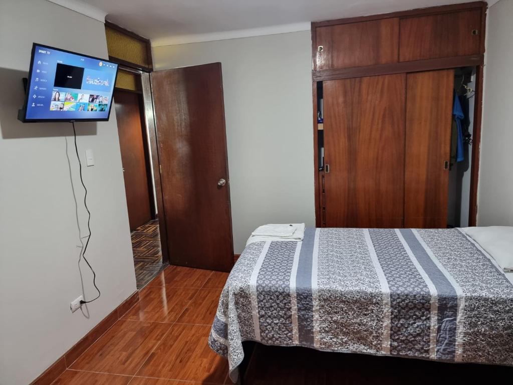 Postel nebo postele na pokoji v ubytování Apart Hotel San Borja
