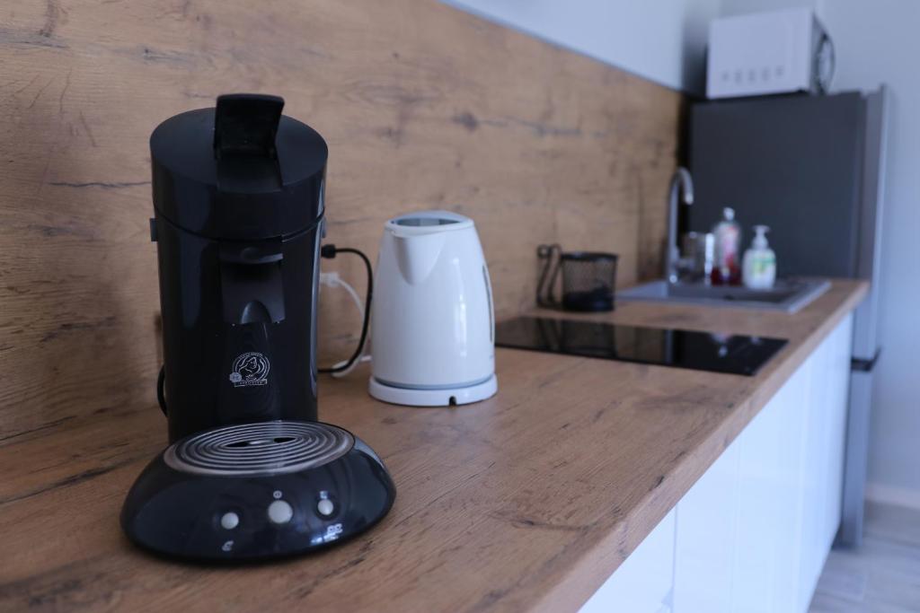 Kuchyňa alebo kuchynka v ubytovaní Apartamenty Pod Jaworami