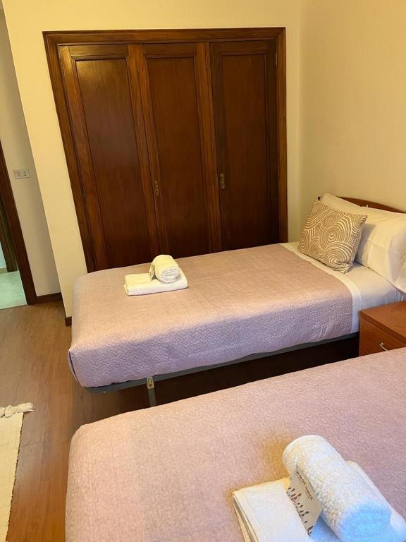 Кровать или кровати в номере Patos Beach III - Olas