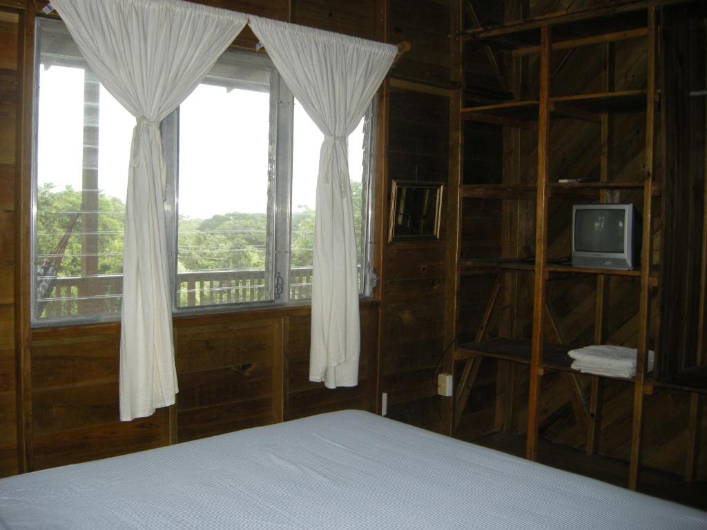 Postel nebo postele na pokoji v ubytování Apartments Chez Milady