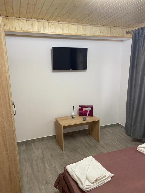 TV a/nebo společenská místnost v ubytování CASA DAVID