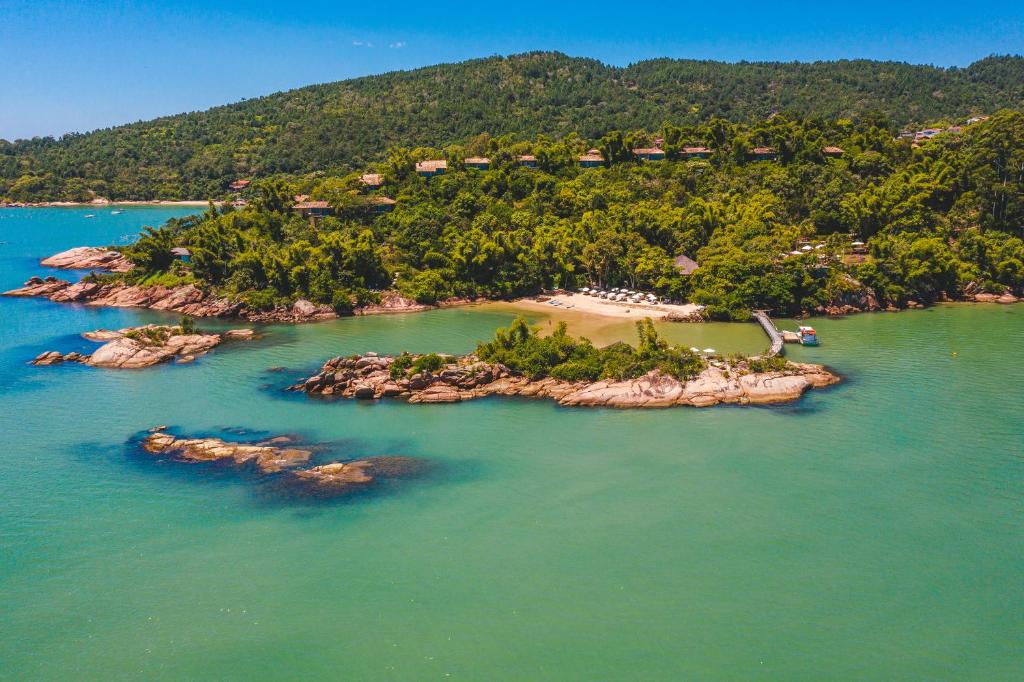 an aerial view of an island in the water at Ponta dos Ganchos Exclusive Resort in Governador Celso Ramos