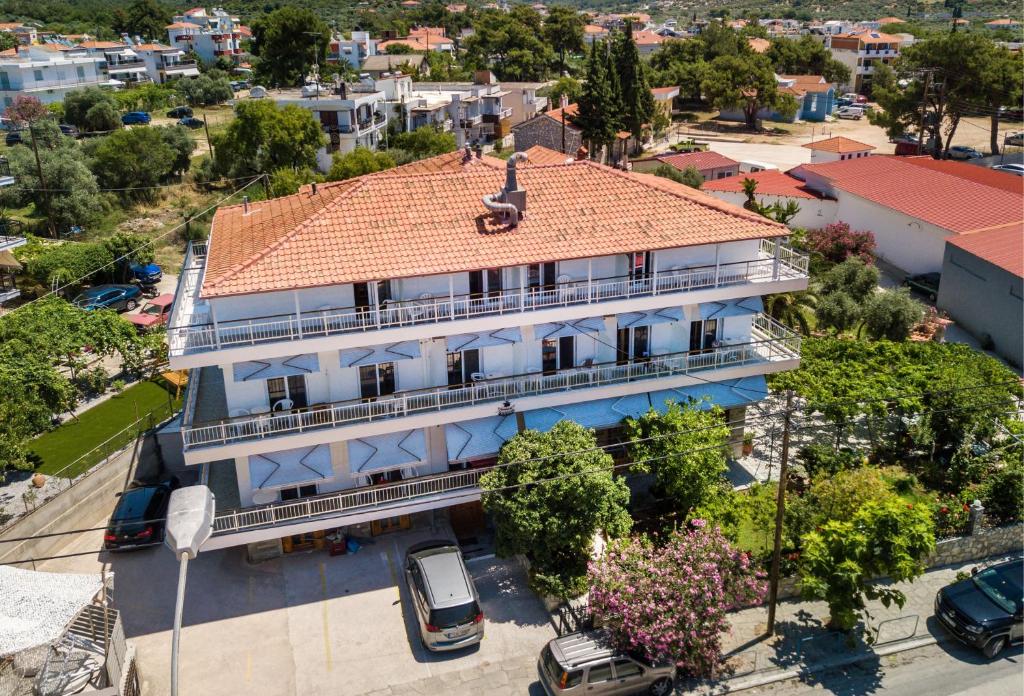 an overhead view of a building with a red roof at Kalogeraki Studios in Potos