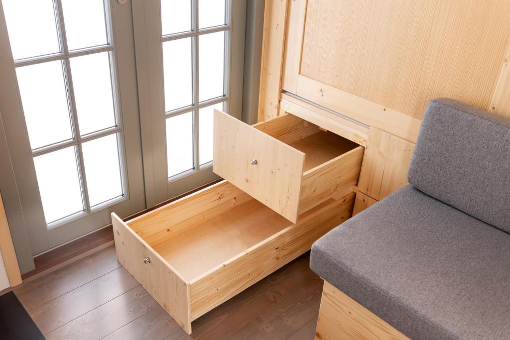 Posezení v ubytování Grimmwald Tiny House